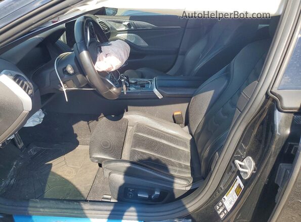 WBAGV8C07RCR10036 2024 BMW M8 Black Front interior view