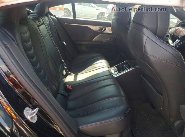 WBAGV8C07RCR10036 2024 BMW M8 Black Rear seats view