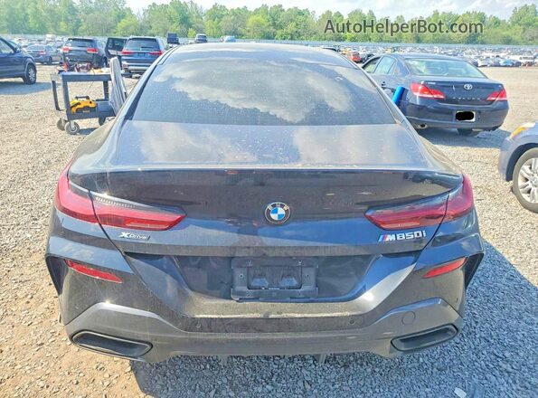 WBAGV8C07RCR10036 2024 BMW M8 Black Rear view
