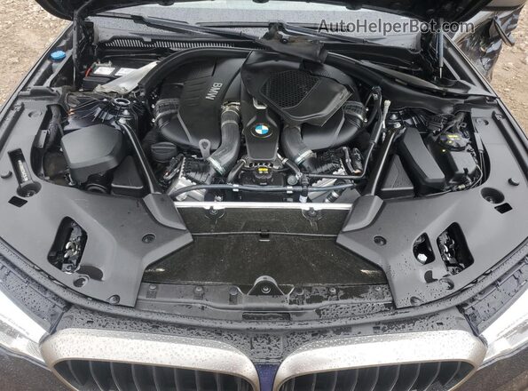 WBAJB9C52JG463631 2018 BMW M5 Blue Widok wnętrza z tyłu