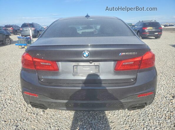 WBAJS7C0XLBN96596 2020 BMW M5 Charcoal Widok z tyłu