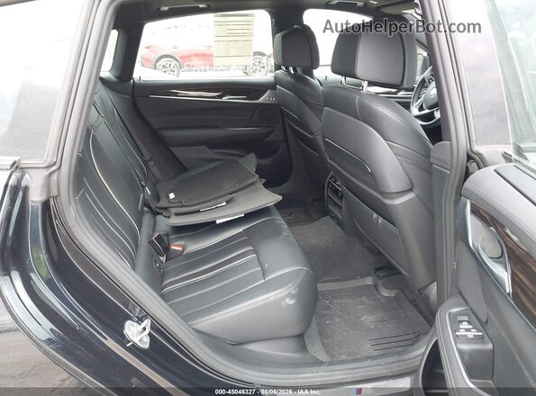 WBAJV6C53JBJ99807 2018 BMW 6 SERIES Black Widok naklejki z numerem VIN