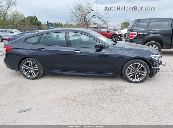 WBAJV6C53JBJ99807 2018 BMW 6 SERIES Black Widok wnętrza z tyłu