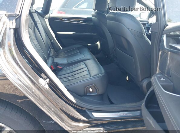 WBAJV6C56KBK08890 2019 BMW 6 SERIES Black VIN sticker view