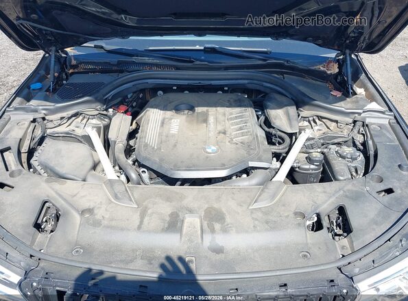 WBAJV6C56KBK08890 2019 BMW 6 SERIES Black Rear view