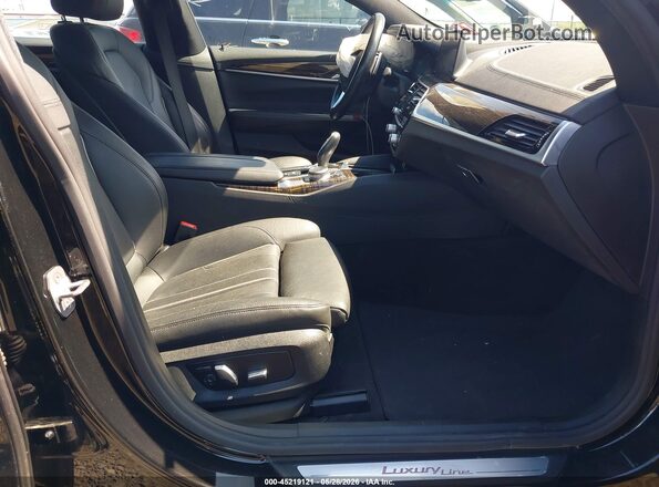 WBAJV6C56KBK08890 2019 BMW 6 SERIES Black Front interior view