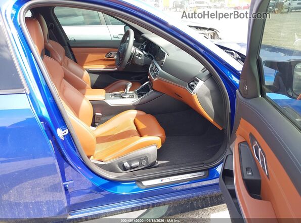 WBS43AY02NFL54571 2022 BMW M3 Blue წინა სალონის ხედი