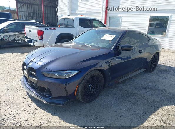 WBS43AZ01PCM97935 2023 BMW M4 Dark Blue Առջևի ձախ երեք քառորդ տեսարան