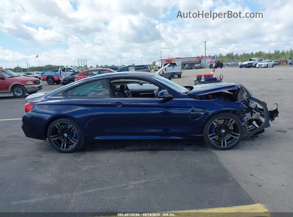WBS4Y9C58JAG66844 2018 BMW M4 Dark Blue Widok wnętrza z tyłu