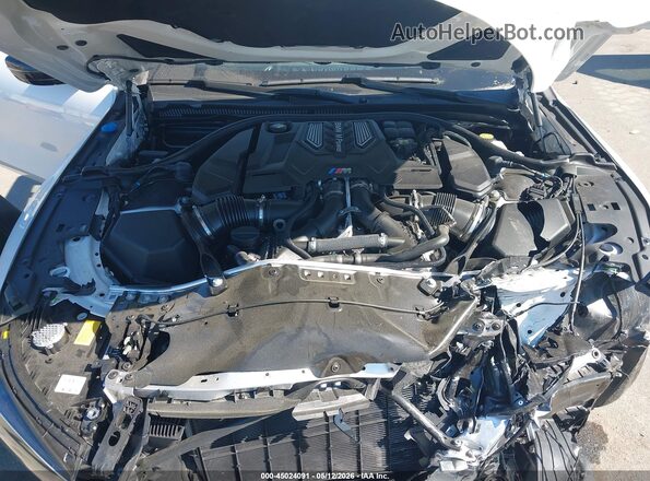 WBSDZ0C00PCL65637 2023 BMW M8 White Widok z tyłu