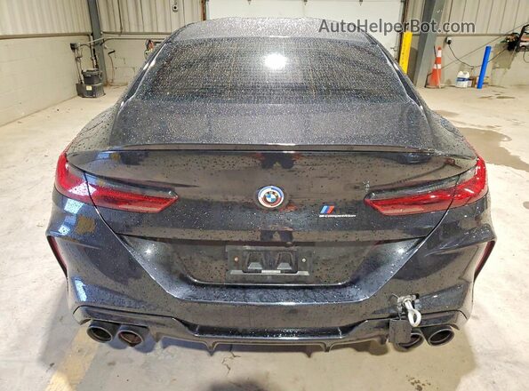 WBSGV0C01PCK32961 2023 BMW M8 Black Widok z tyłu