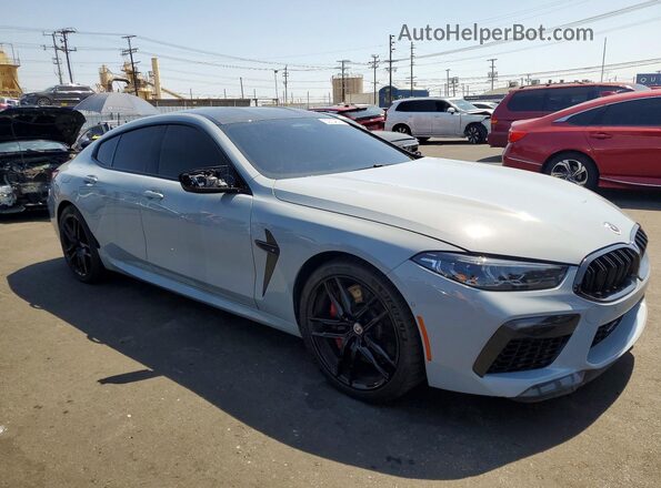 WBSGV0C03PCL80271 2023 BMW M8 Серый Передняя правая четверть