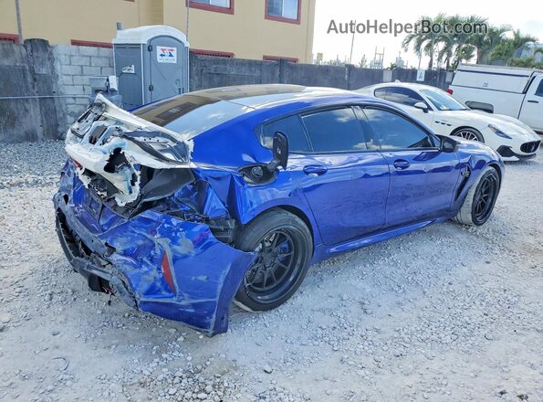 WBSGV0C09NCJ55155 2022 BMW M8 Blue Trasero derecho
