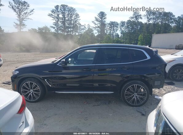 WBX47DP06NN158351 2022 BMW X3 Black Widok wnętrza z tyłu