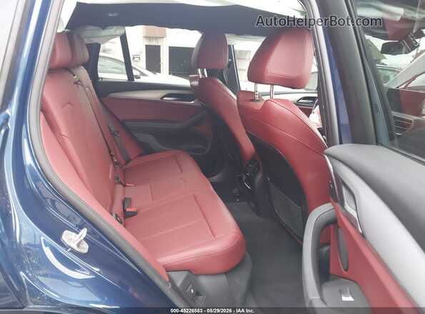 WBX57DP01NN174140 2022 BMW X3 Blue Widok naklejki z numerem VIN