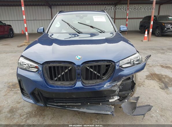 WBX57DP01NN174140 2022 BMW X3 Blue Widok wnętrza z tyłu
