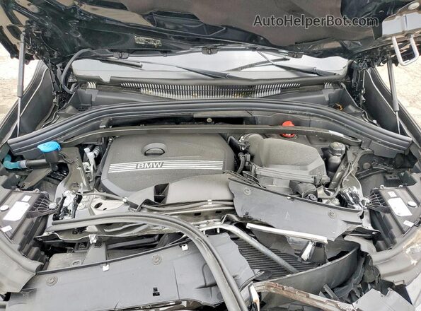 WBX73EF00T5404016 2026 BMW X1 Black Vista del compartimento del motor