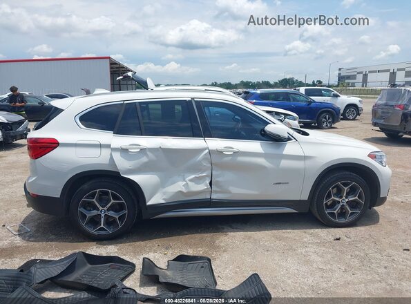 WBXHT3C30GP883524 2016 BMW X1 White Սալոնի հետևի տեսք