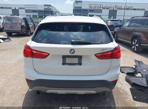 WBXHT3C30GP883524 2016 BMW X1 White 