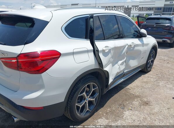 WBXHT3C30GP883524 2016 BMW X1 White Դիմացի տեսք