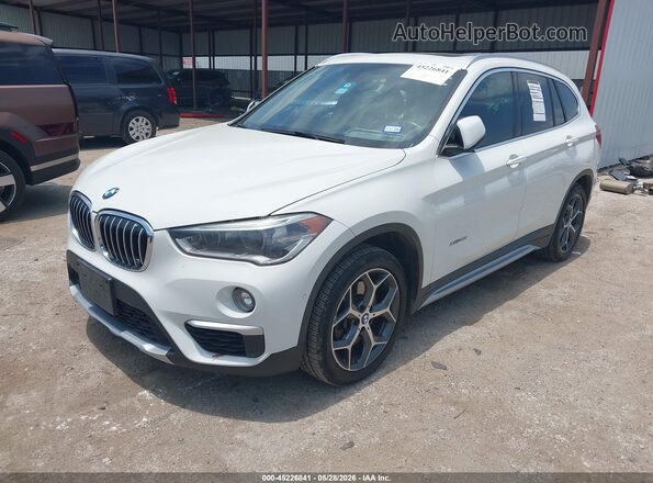 WBXHT3C30GP883524 2016 BMW X1 White Առջևի ձախ երեք քառորդ տեսարան