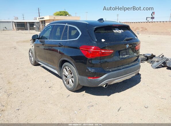 WBXHT3C30GP886455 2016 BMW X1 Черный Задняя левая четверть