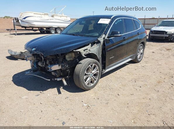 WBXHT3C30GP886455 2016 BMW X1 Черный Передняя левая четверть