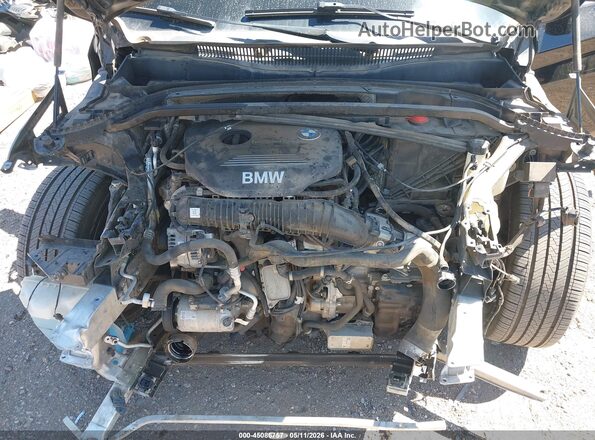 WBXHT3C30GP886455 2016 BMW X1 Черный Вид сзади