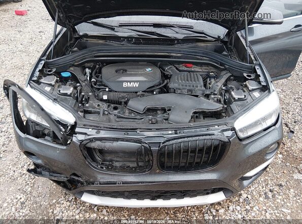 WBXHT3C30J5K21459 2018 BMW X1 Gray Rear view