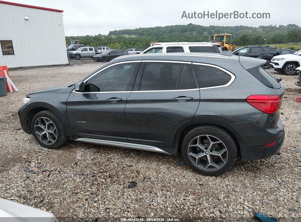 WBXHT3C30J5K21459 2018 BMW X1 Gray 360 interior view