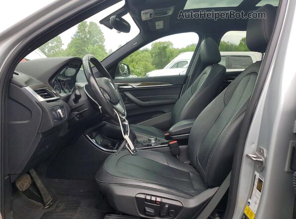 WBXHT3C31GP886321 2016 BMW X1 Silver წინა სალონის ხედი