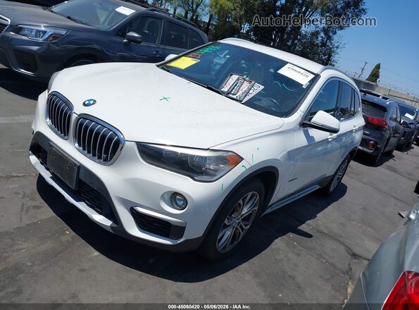 WBXHT3C31H5F76847 2017 BMW X1 White წინა მარცხენა ხედი სამი მეოთხედიდან