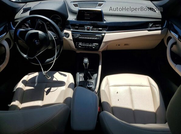WBXHT3C31J5L27998 2018 BMW X1 Charcoal Առջևի վահանակի տեսք