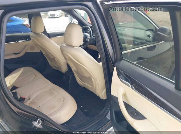 WBXHT3C32G5F63636 2016 BMW X1 Black Vista de la etiqueta del VIN