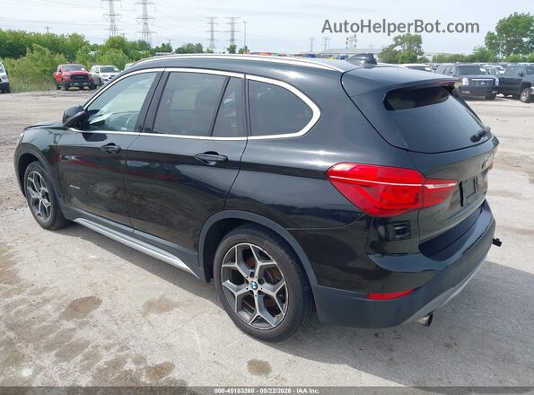 WBXHT3C32G5F63636 2016 BMW X1 Black Trasero izquierdo