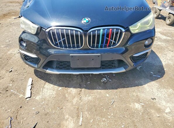 WBXHT3C32H5F72788 2017 BMW X1 Black ძრავის განყოფილების ხედი