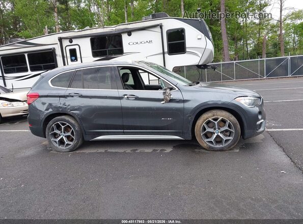 WBXHT3C33J5K27627 2018 BMW X1 Gray Widok wnętrza z tyłu