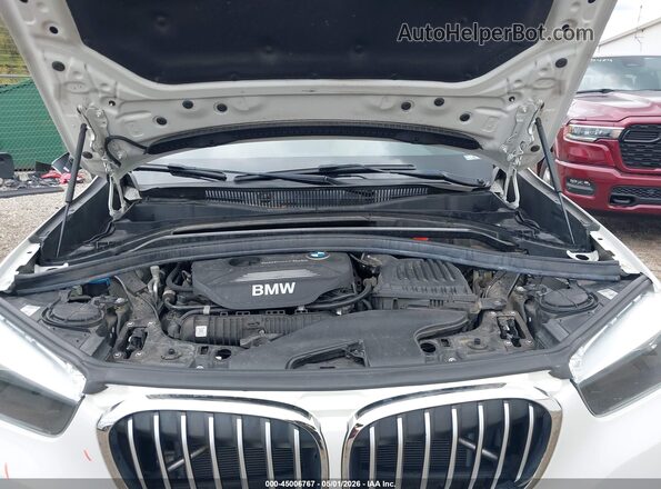 WBXHT3C33J5L27601 2018 BMW X1 White Rear view