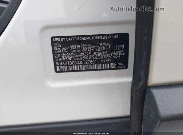 WBXHT3C33J5L27601 2018 BMW X1 White Engine compartment view
