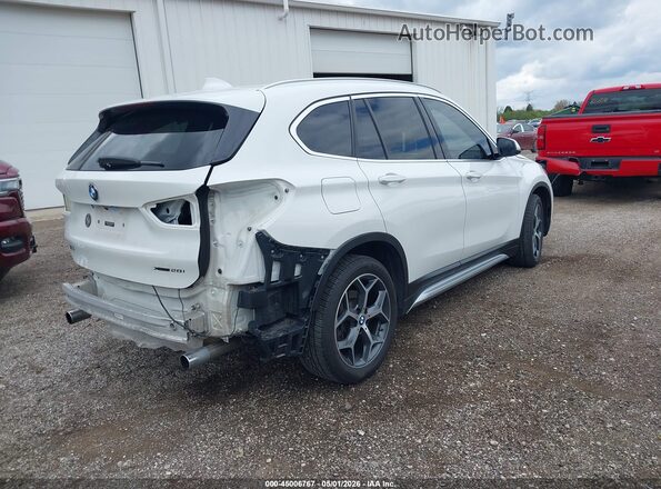 WBXHT3C33J5L27601 2018 BMW X1 White Rear right