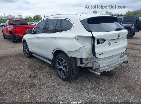 WBXHT3C33J5L27601 2018 BMW X1 White Rear left
