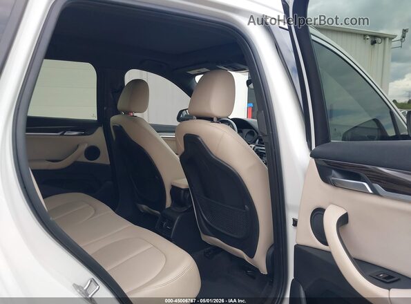 WBXHT3C33J5L27601 2018 BMW X1 White VIN sticker view