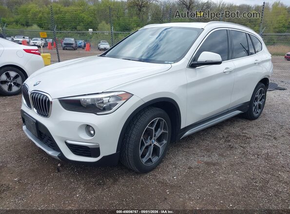 WBXHT3C33J5L27601 2018 BMW X1 White Front left