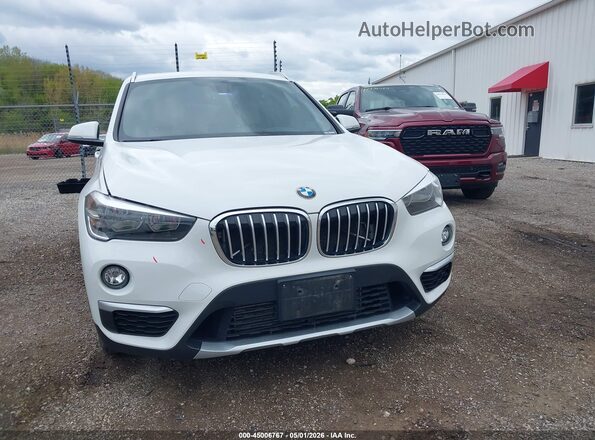 WBXHT3C33J5L27601 2018 BMW X1 White Rear interior view