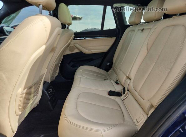 WBXHT3C34GP883428 2016 BMW X1 Синий Вид задней части салона