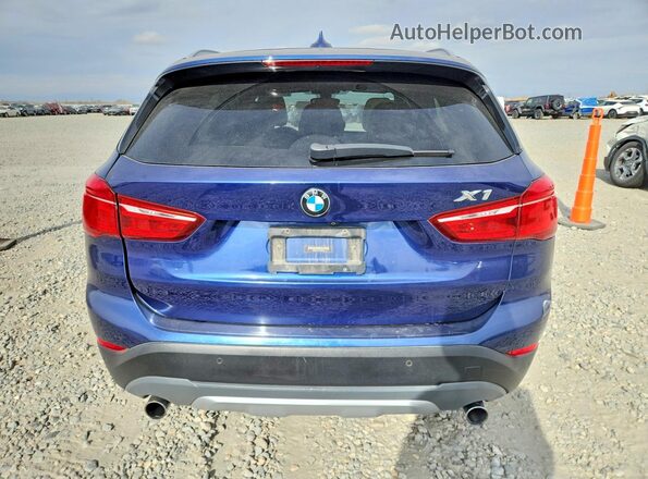 WBXHT3C34GP883428 2016 BMW X1 Синий Вид сзади