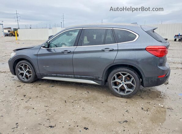 WBXHT3C34H5F85185 2017 BMW X1 Gray Rear left