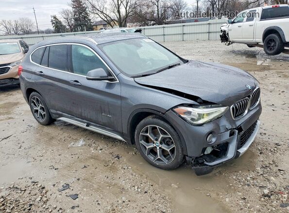 WBXHT3C34H5F85185 2017 BMW X1 Gray Front right