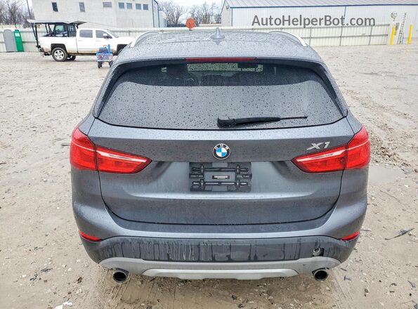 WBXHT3C34H5F85185 2017 BMW X1 Gray Rear view