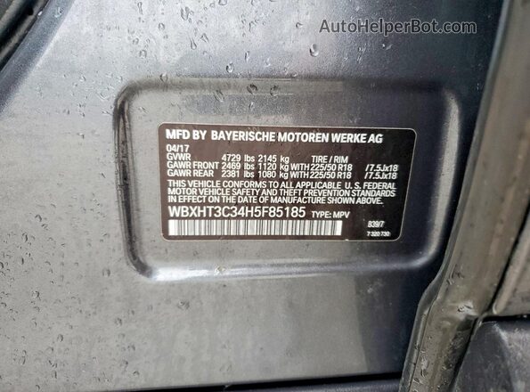 WBXHT3C34H5F85185 2017 BMW X1 Gray VIN sticker view